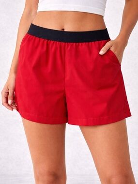 Express Red Athletic Shorts with Black Waistband size 6 woman’s